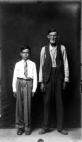 http://bernalespacio.com/files/gimgs/th-47_MikeDisfarmer From the Heber Springs Portraits (man and boy with arms at sides) 1940s.jpg